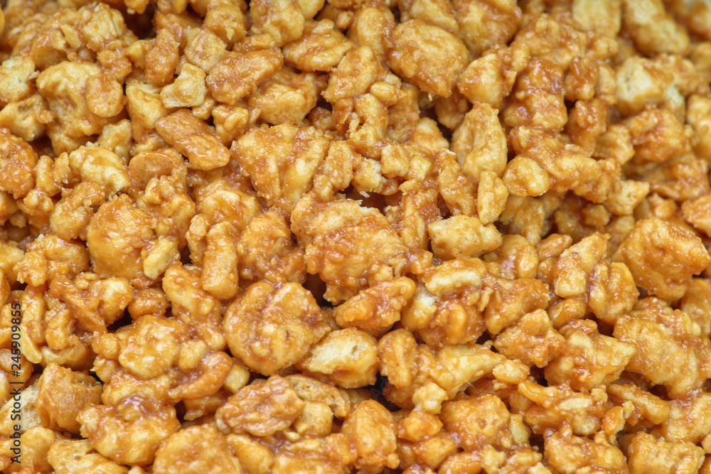 Sweet background and texture, nuts in caramel, close-up Sweet background and texture, nuts in caramel, close-up