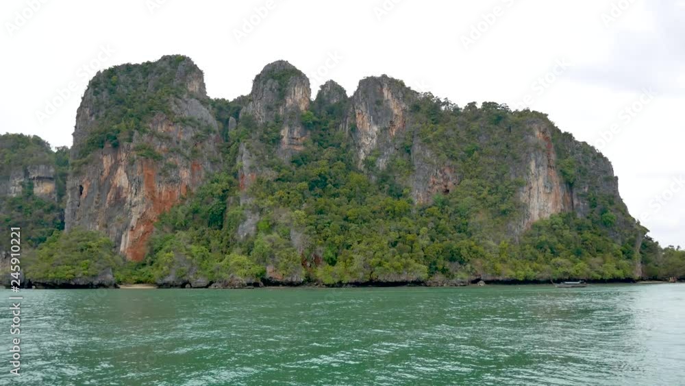 Rocky Shore With Tropical Jungle And Turquoise Water Of The Sea Rocky Shore With Tropical Jungle And Turquoise Water Of The Sea