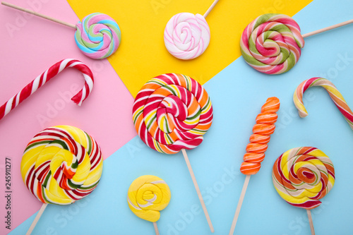 Many lollipops on colorful background, Sweets concept