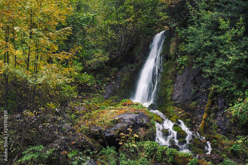 waterfall in the mountains in autumn