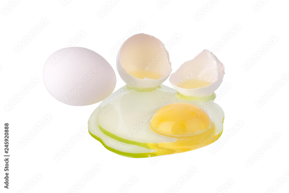 Broken white egg and one whole egg on white background isolated close up, cracked eggshell and liquid egg with yellow yolk, two halves of egg shell macro Broken white egg and one whole egg on white background isolated close up, cracked eggshell and liquid egg with yellow yolk, two halves of egg shell macro