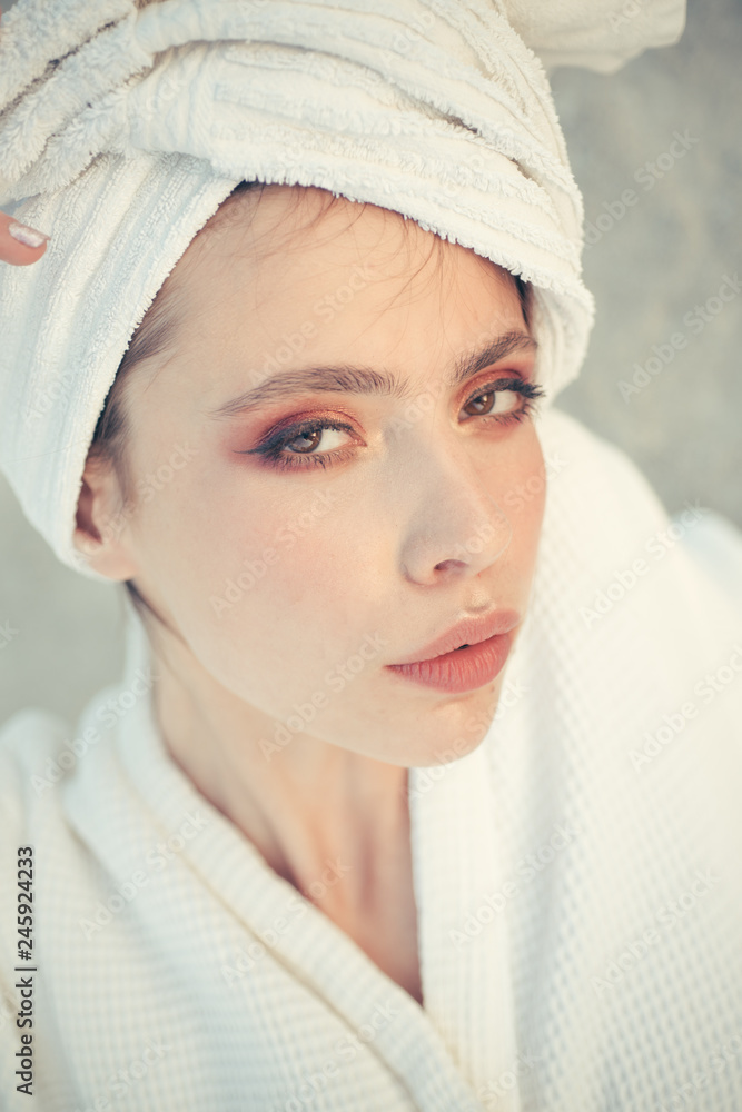 Obraz premium Her haircare routine. Beauty routine and hygiene care. Pretty woman wear bath towel on head. Young woman in bathing gown. Skincare model after spa bath. Skincare at spa. Beauty salon. Bathing habits