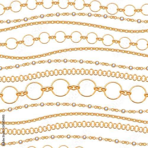 Assorted golden chains on white background.