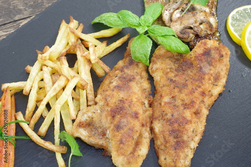  fried fish with vegetables photo