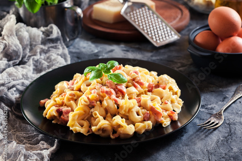 Fresh tortellini with homemade carbonara sauce photo