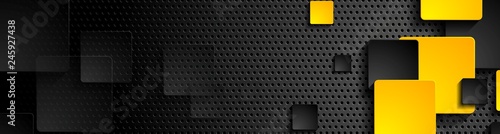 Orange black squares on dark perforated background
