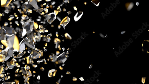 Particles and fragments of glass or crystals on a black background