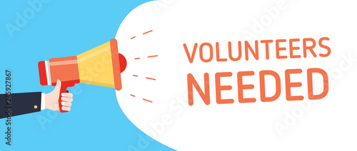 Arm holding a megaphone with text bubble volunteers needed