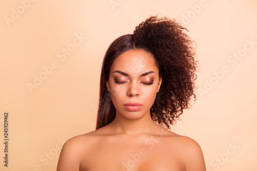 Close-up portrait of nice attractive groomed glamorous winsome charming lady perfect shine smooth clean clear flawless silky pure skin two side different hair isolated on beige pastel background