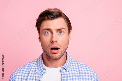 Close up photo of attractive amazed really oh no he him his man do not want such bad finish ending mouth opened wearing casual plaid shirt outfit isolated on pale rose background