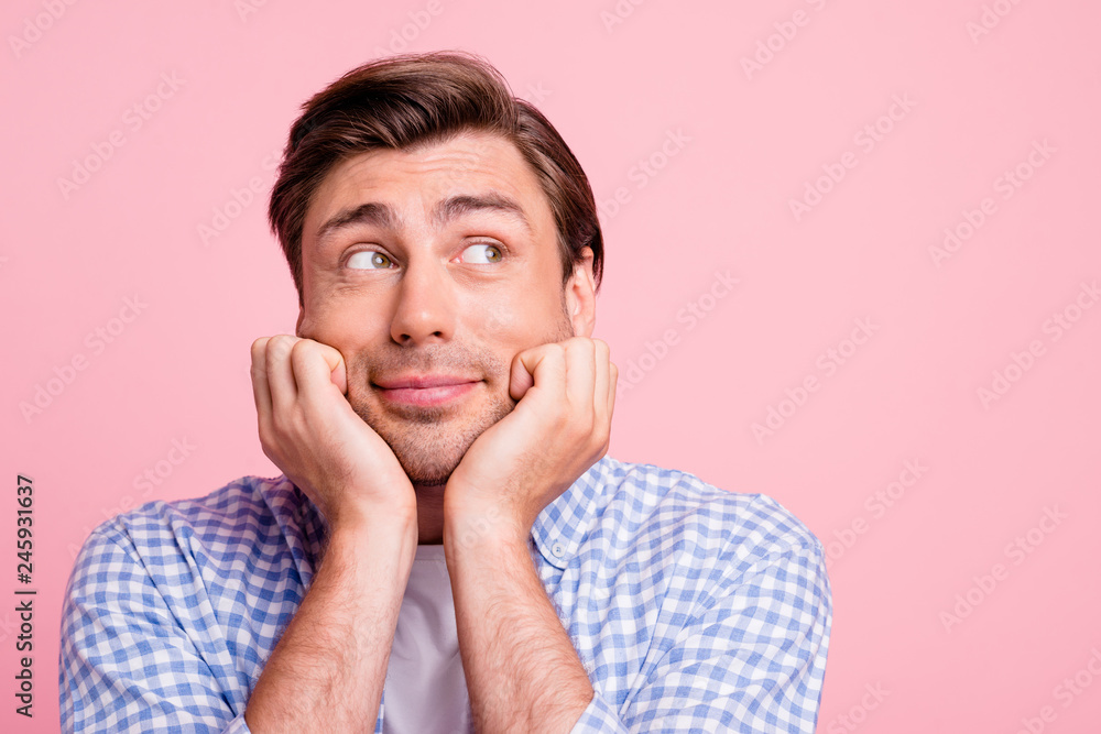 Close-up portrait of his he nice cute funny attractive handsome calm guy wearing checked shirt looking up aside thinking isolated over pink pastel background