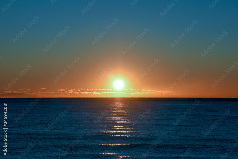 Backlight sea sunrise over the Mediterranean Sea, Alassio, Liguria, Italy Backlight sea sunrise over the Mediterranean Sea, Alassio, Liguria, Italy