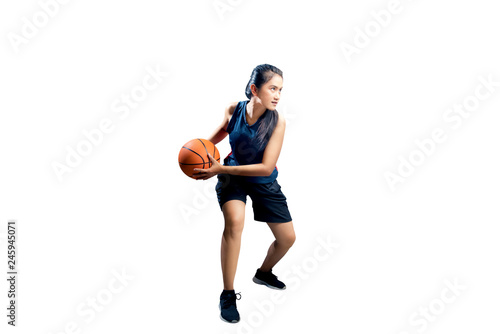 Young asian girl playing basketball