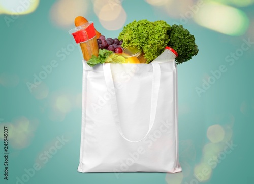 Full shopping bag, isolated over background