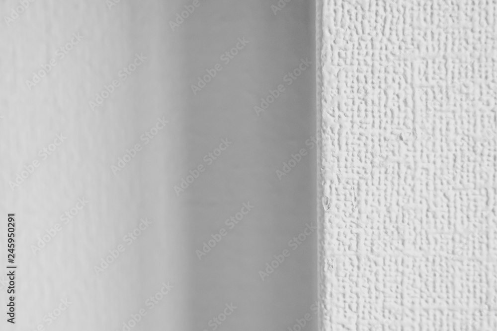 Wall Roughness Texture Example Roughness texture White wallpaper on the wall at a different angle. An ...