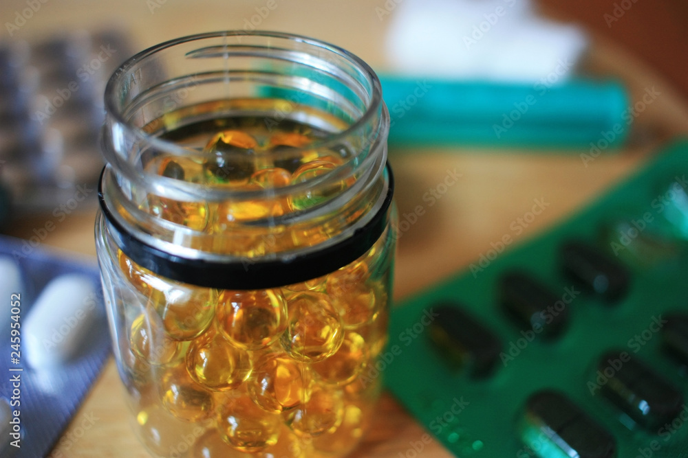 Yellow fish oil capsules