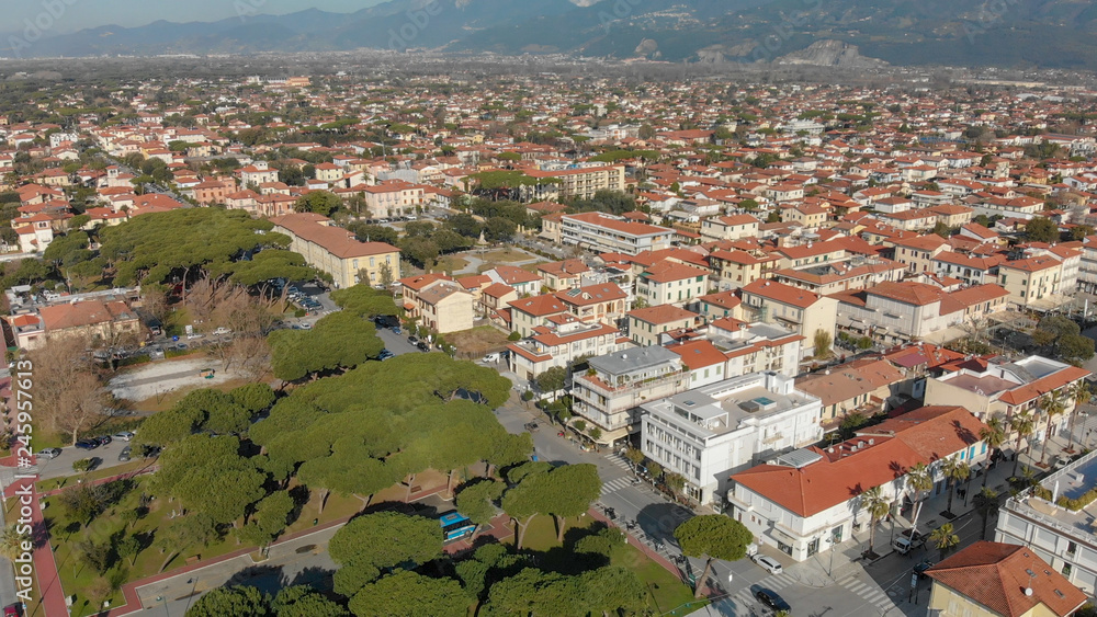 Aerial panoramic view of Forte dei Marmi skyline on a sunny winter morning, drone perspective