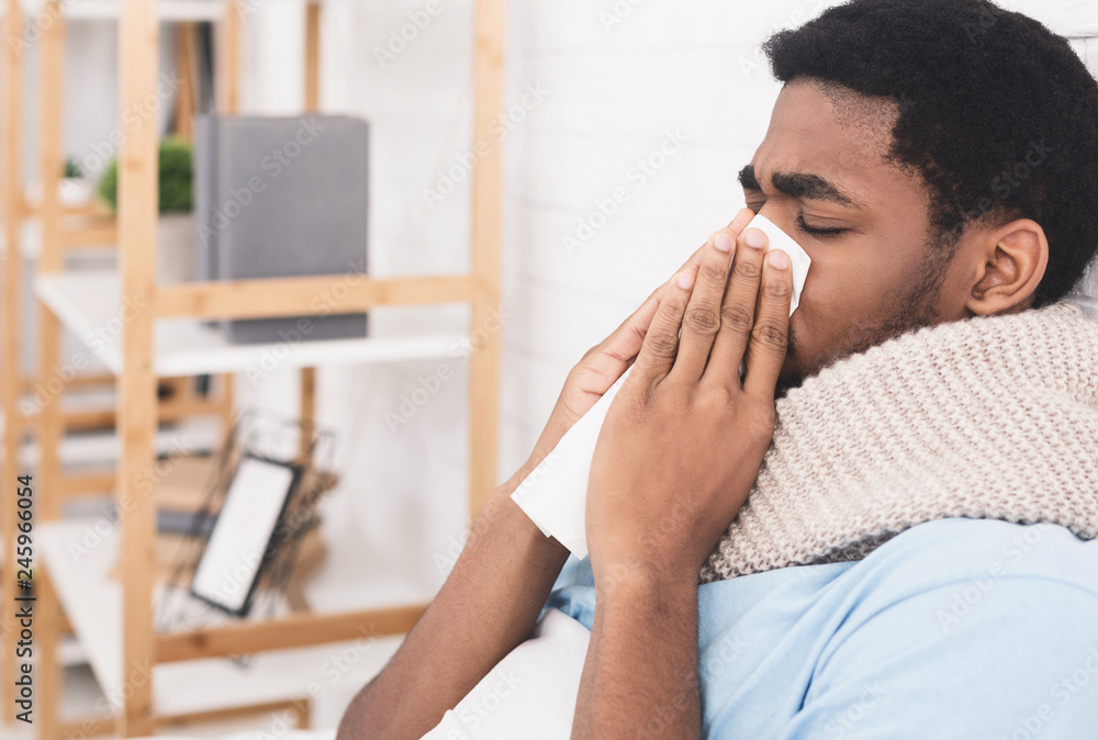 African-american man man has runny nose at home African-american man man has runny nose at home