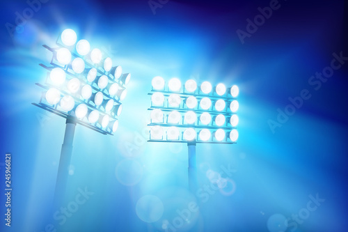 Floodlights illuminating the stadium. Sports event. Abstract vector illustration.