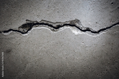 texture crack in concrete wall close-up