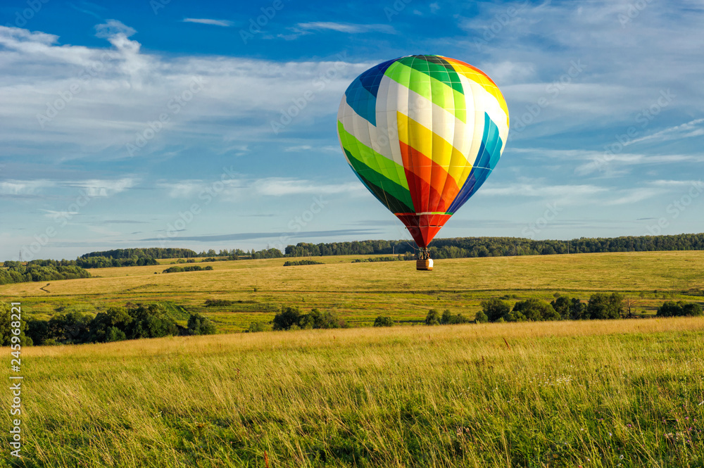 Naklejka premium Many colorfull balloons in the sky at blue sky with clouds background 