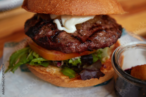 Closeup delicious fresh beef burger with mayonnaise and ketchup