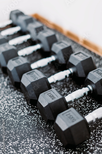Weights in a row in a gym