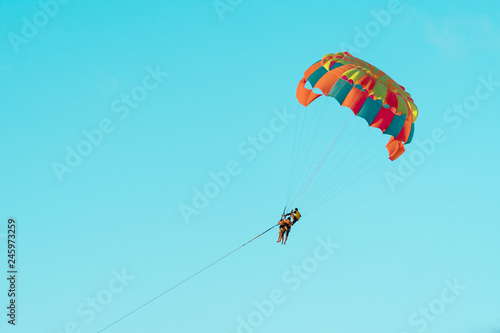 Evening parasailing on the beach of Patong, Phuket province, Kingdom of Thailand