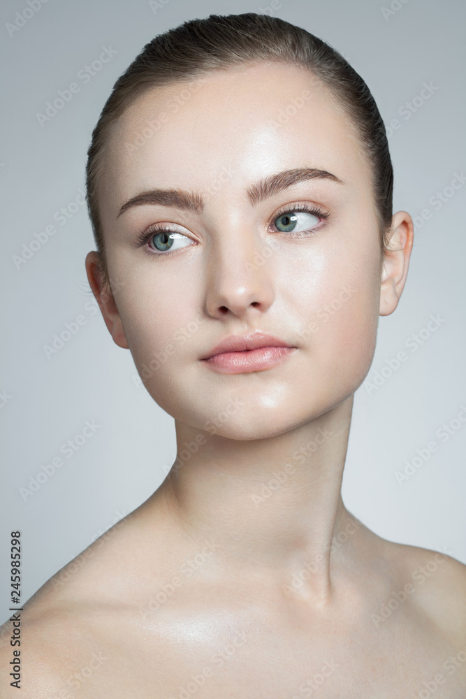 Portrait of a young woman with beautiful skin and blue eyes. Portrait of a young woman with beautiful skin and blue eyes.