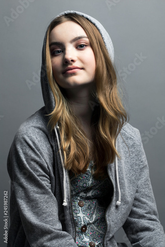 Portrait of smiling woman with blond hair in jacket