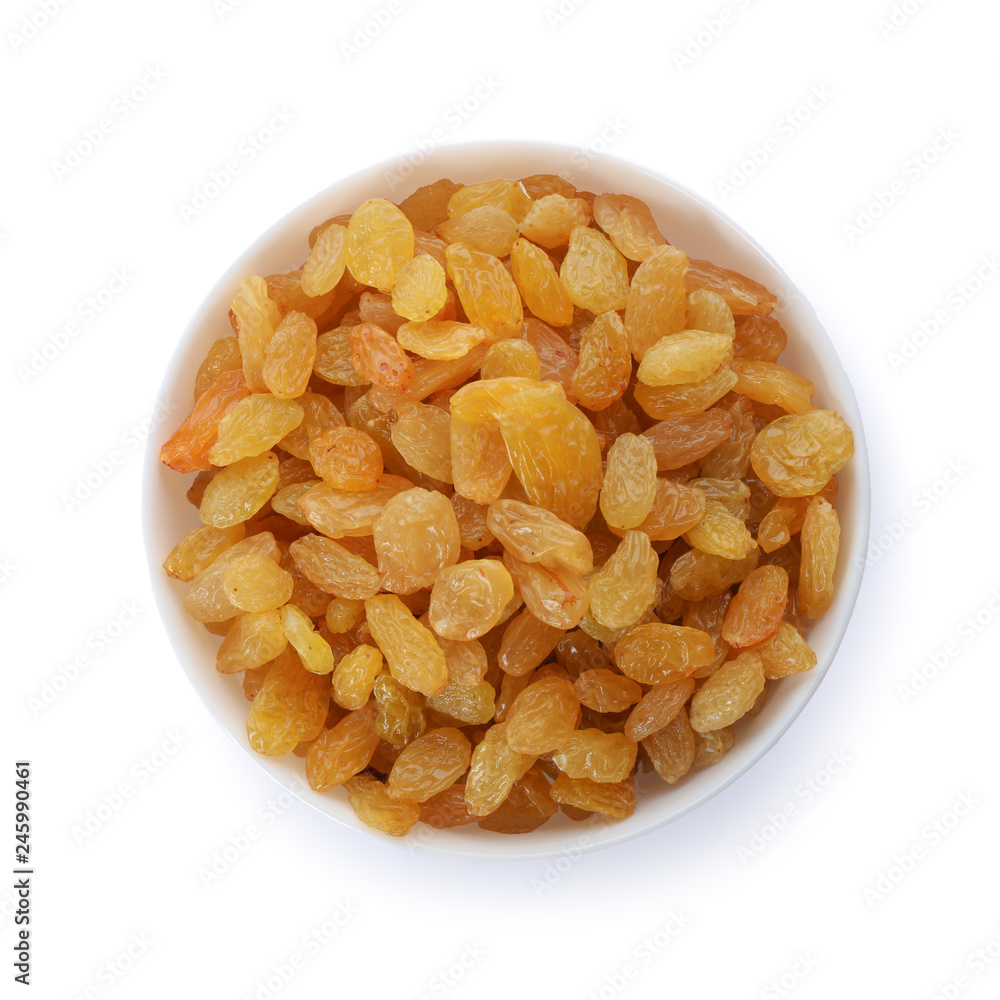 Bowl with dried golden raisins isolated on white, top view. Healthy nutrition with fruits Bowl with dried golden raisins isolated on white, top view. Healthy nutrition with fruits