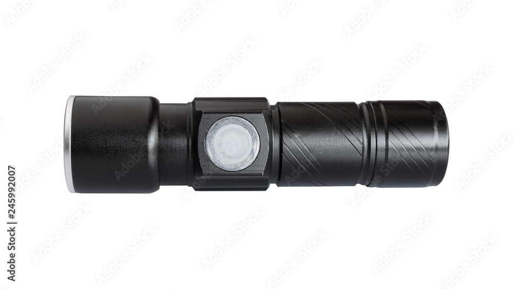 Close-up a small flashlight isolated on white background. Close-up a small flashlight isolated on white background.