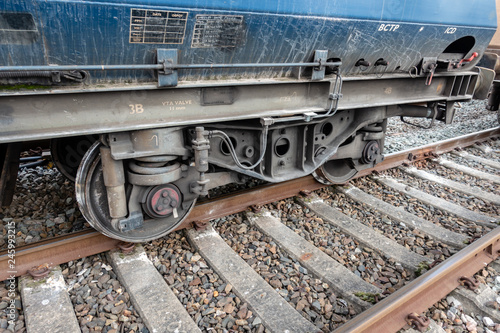 Tableau sur toile Freight train with derailed wheel set