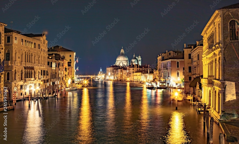 Italy beauty, night cathedral Santa Maria della Salute and Grand canal in Venice, Venezia