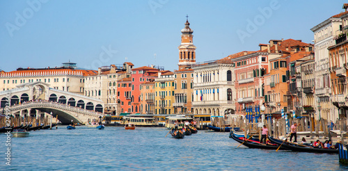 Italy beauty, gondolas near to Rialto bridge on Grand canal in Venice, Venezia