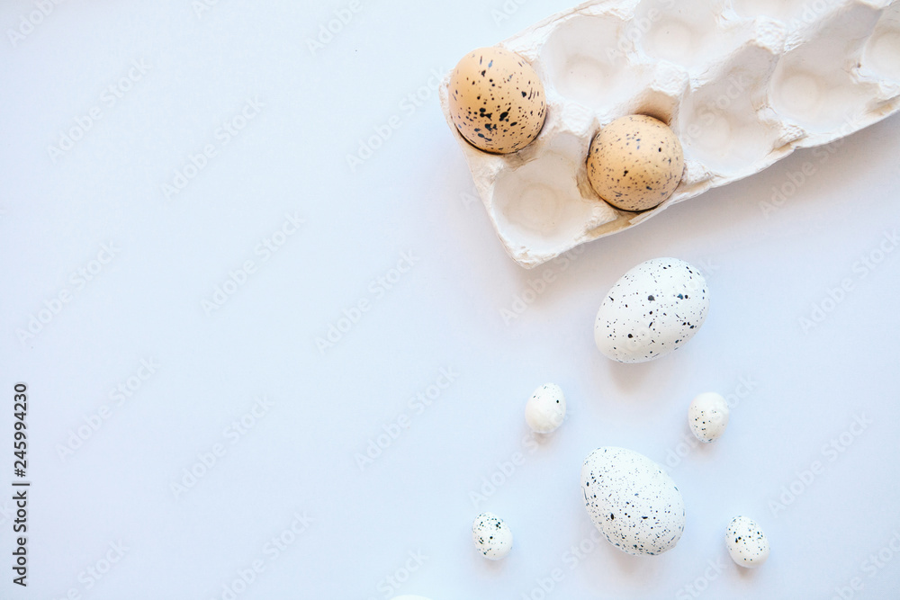 Set of eggs on a white background. Festive Easter background. Nearby there is a place for text.