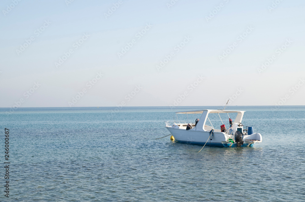 Anchored boat in the sea in Hurgada