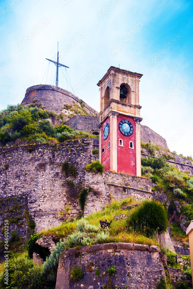 Beautiful landscape with a clock and bell tower in the old fortress in Kerkira, Corfu, Greece. popular tourist attractions. amazing places.