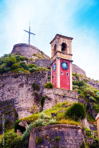 Obraz na płótnie Beautiful landscape with a clock and bell tower in the old fortress in Kerkira, Corfu, Greece. popular tourist attractions. amazing places. w salonie