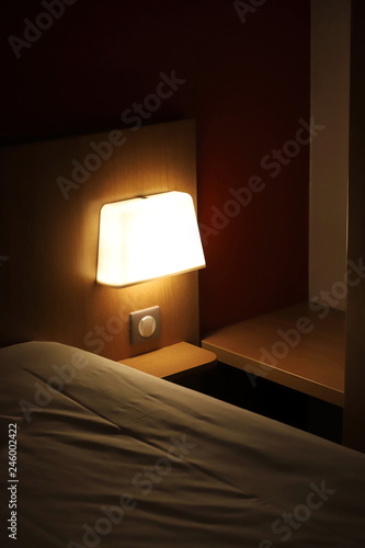 bedside lamp in a hotel