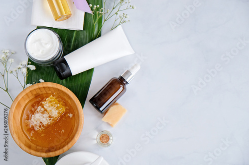 Spa natural skin care products background, cosmetic products creative layout with a space for a text, top view, flat lay