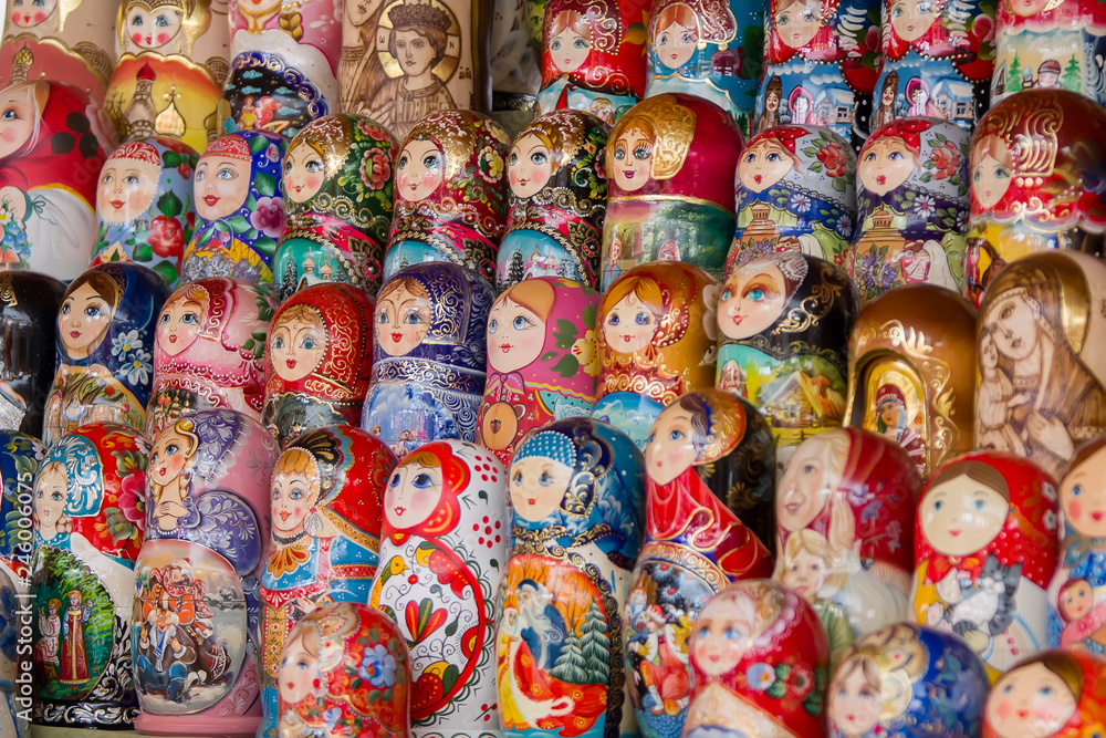 Background of colorful Russian dolls on the market.Russian traditional Matryoshka souvenirs at the fair