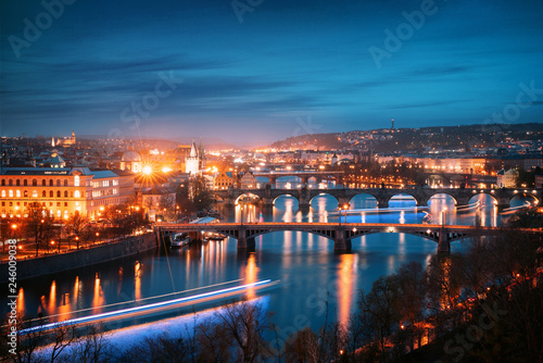 Prague cityscape at night. Aerial view of the bridges on the Vltava river