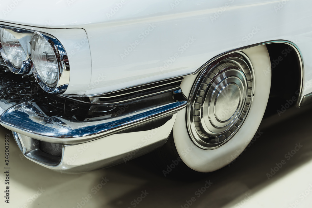 background - fragment of a white vintage car