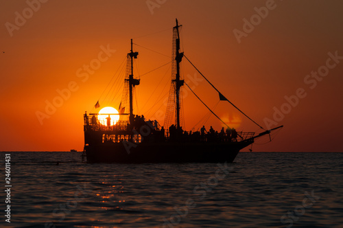 old ship at sunset