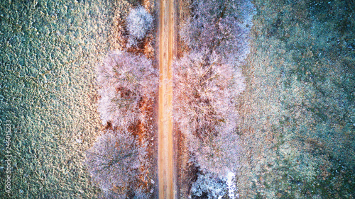 Obraz na płótnie Aerial view of frozen road in early spring w salonie