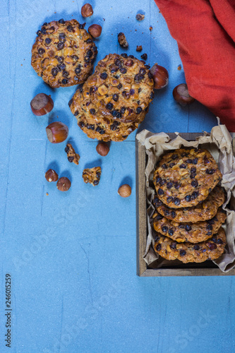 Oats cookies with chocolate chips and hazelnuts photo