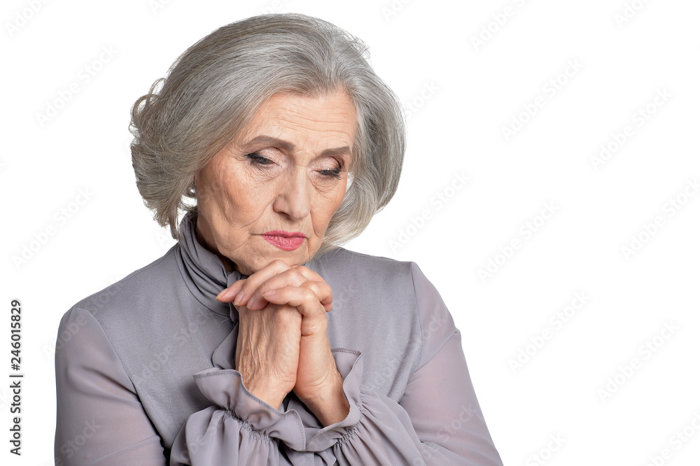 Sad senior woman isolated on white background Sad senior woman isolated on white background