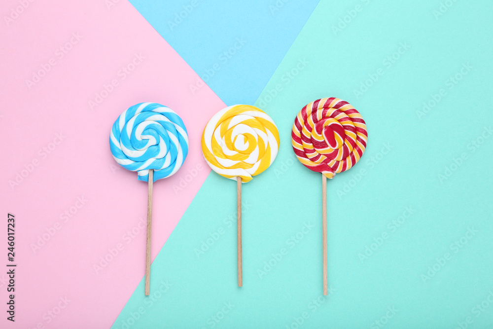 Sweet lollipops on colorful background Sweet lollipops on colorful background