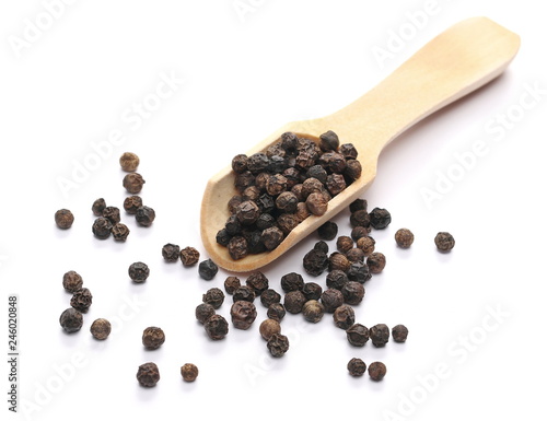 Black pepper, peppercorn in wooden spoon isolated on white background